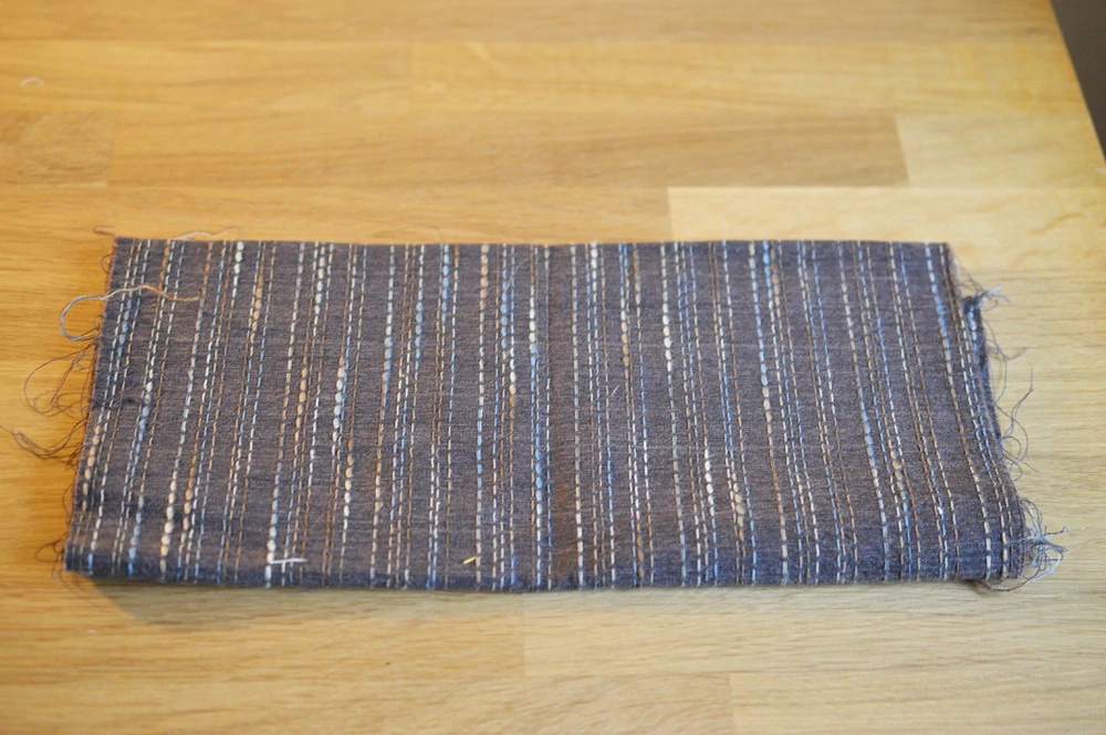 Hnědá prošívaná